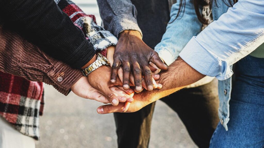 Hands coming in together