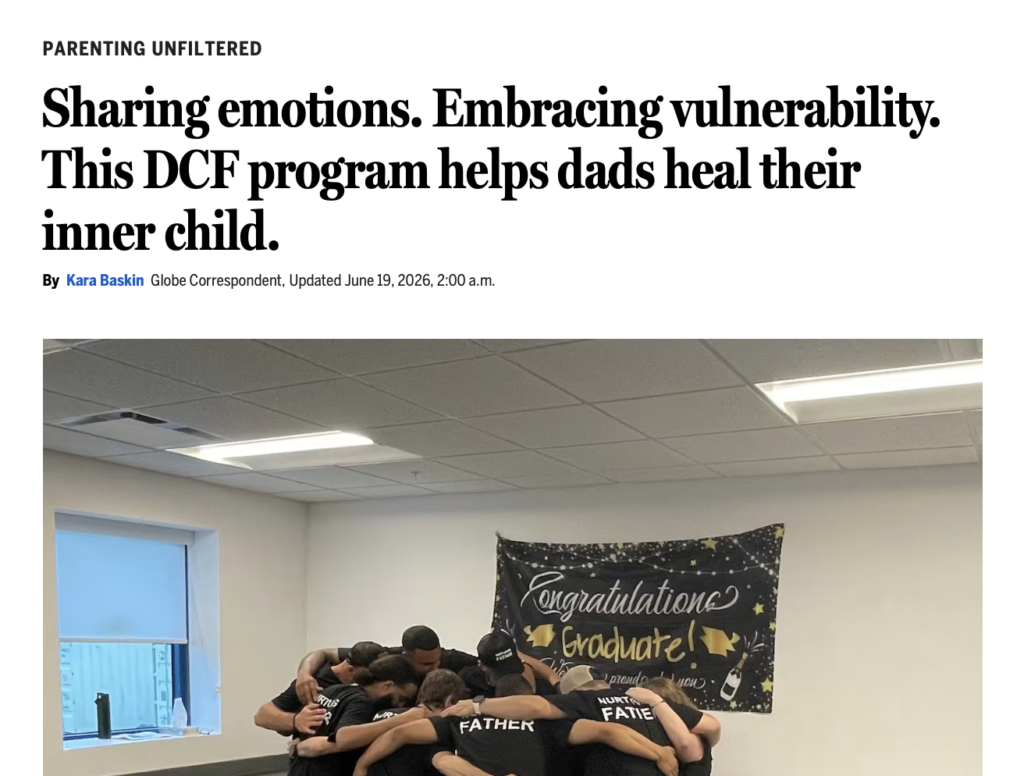 Screenshot of a Boston Globe Parenting Unfiltered article. Headline reads "Sharing emotions. Embracing vulnerability. This DCF program helps dads heal their inner child." Byline: Kara Baskin, Globe Correspondent, updated June 19, 2026. Below the headline, a photo shows a group of men in matching dark t-shirts standing in a huddle with arms around each other, in a room with a "Congratulations Graduate" banner on the wall.